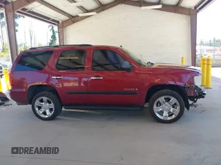 2007 Chevrolet Tahoe LS with VIN 1GNFC13C07R256584, listed as a IAAI auction lot 42678748 with 214,040 mi miles and . Bid and sale history available at DreamBid. Image 14.