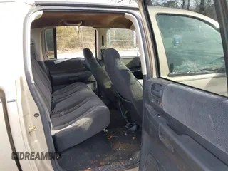 2003 Dodge Dakota SLT with VIN 1D7HL48X53S348636, listed as a IAAI auction lot 41329221 with 133,075 mi miles. Bid and sale history available at carsss.com. Image 8.
