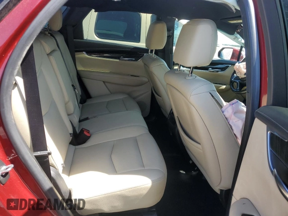 2018 Cadillac XT5 FWD with VIN 1GYKNARS1JZ205595, listed as a Copart auction lot 52428565 with 106,927 mi miles and Salvage title. Bid and sale history available at DreamBid. Image 10.