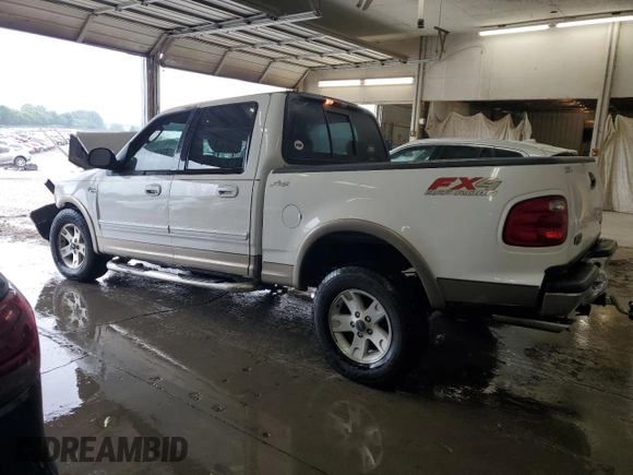 2003 Ford F-150 XLT with VIN 1FTRW08L23KA65560, listed as a Copart auction lot 61349145 with 207,887 mi miles and Salvage title. Bid and sale history available at DreamBid. Image 2.