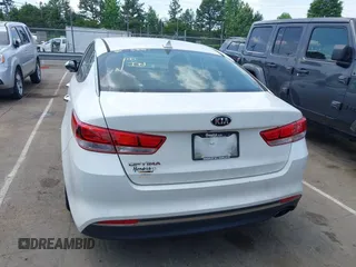 2016 Kia Optima LX with VIN 5XXGT4L34GG061718, listed as a IAAI auction lot 42176256 with 115,572 mi miles and . Bid and sale history available at carsss.com. Image 16.