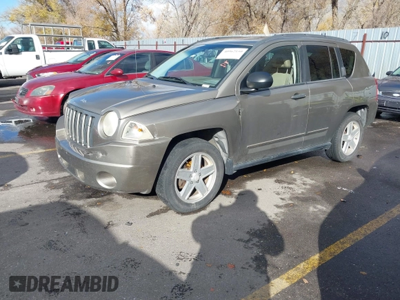 2007 Jeep Compass Sport with VIN 1J8FF47W37D325148, listed as a IAAI auction lot 40962150 with 198,345 mi miles. Bid and sale history available at carsss.com. Image 2.