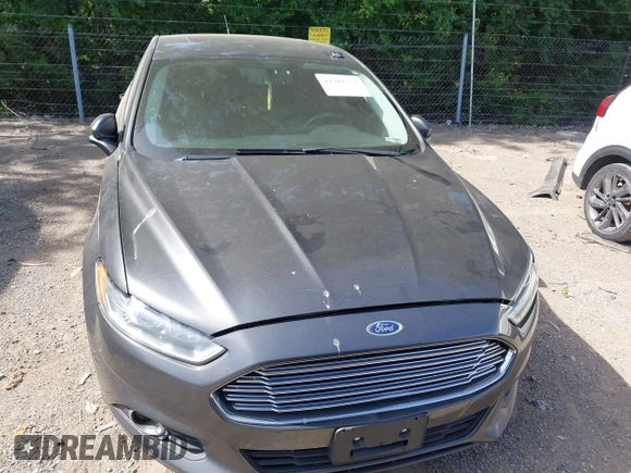 2015 Ford Fusion SE z VIN 3FA6P0H98FR275848, wystawiony jako IAAI lot #42311852 z przebiegiem 197 536 mil mil oraz . Historia ofert i sprzedaży dostępna na DreamBid. Obrazek 6.