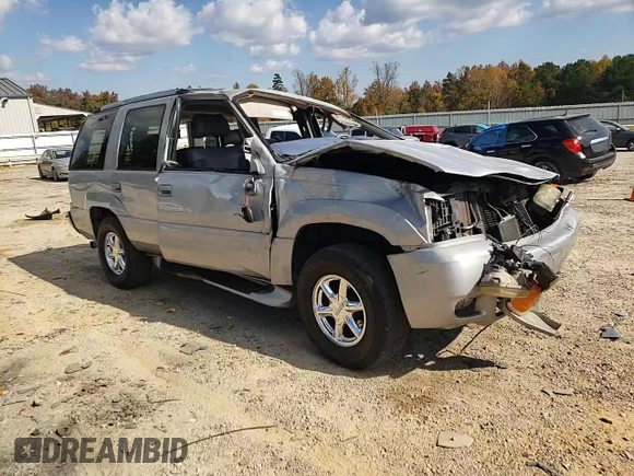 2000 GMC Denali z VIN 1GKEK13R2YR138523, wystawiony jako Copart lot #77609804 z przebiegiem 203 514 mil mil oraz Szkody całkowita. Historia ofert i sprzedaży dostępna na DreamBid. Obrazek 11.