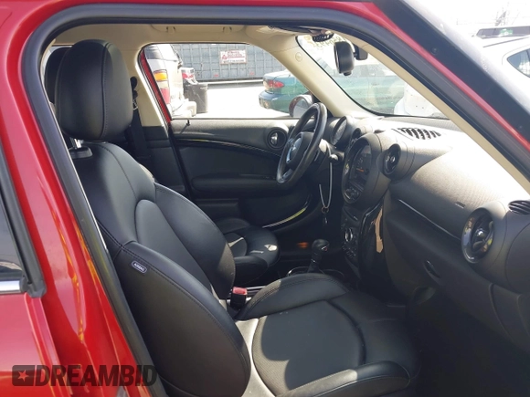 2015 MINI Countryman S z VIN WMWZC3C56FWT06095, wystawiony jako IAAI lot #41856493 z przebiegiem 44 699 mil mil oraz . Historia ofert i sprzedaży dostępna na DreamBid. Obrazek 5.
