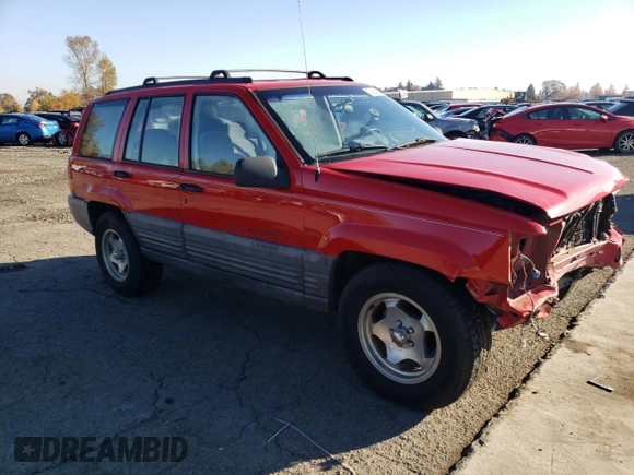 1998 Jeep Grand Cherokee Laredo with VIN 1J4GZ58S3WC245142, listed as a Copart auction lot 79434534 with 276,971 mi miles and Salvage Title. Bid and sale history available at carsss.com. Image 4.
