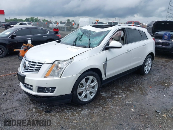 2015 Cadillac SRX Performance Collection with VIN 3GYFNFE35FS613177, listed as a IAAI auction lot 42102352 with Not provided miles and . Bid and sale history available at DreamBid. Image 2.