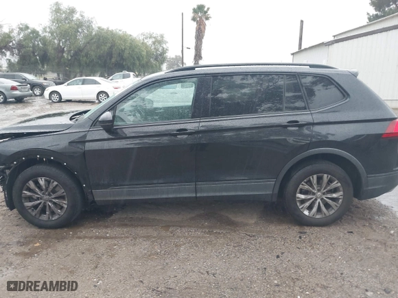 2018 Volkswagen Tiguan S with VIN 3VV1B7AX0JM101932, listed as a IAAI auction lot 41725112 with 143,780 mi miles. Bid and sale history available at carsss.com. Image 14.