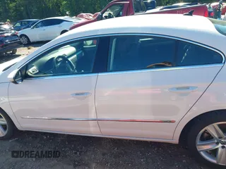 2013 Volkswagen CC Sport z VIN WVWAP7AN7DE545141, wystawiony jako IAAI lot #42325238 z przebiegiem 170 478 mil mil oraz . Historia ofert i sprzedaży dostępna na DreamBid. Obrazek 15.