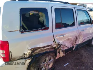 2014 Jeep Patriot Latitude with VIN 1C4NJPFB0ED719270, listed as a IAAI auction lot 40870355 with 207,613 mi miles and . Bid and sale history available at DreamBid. Image 6.