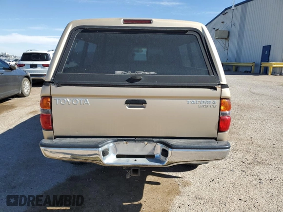 2002 Toyota Tacoma z VIN 5TEWN72N62Z899270, wystawiony jako Copart lot #54070605 z przebiegiem 243 516 mil mil oraz Czysty tytuł • Clean title. Historia ofert i sprzedaży dostępna na DreamBid. Obrazek 6.
