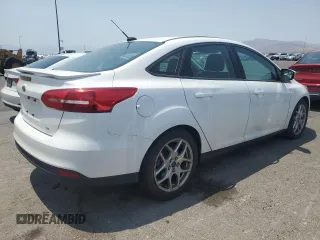 2015 Ford Focus SE with VIN 1FADP3F23FL319168, listed as a Copart auction lot 64411645 with 213,852 mi miles and Clean title. Bid and sale history available at DreamBid. Image 3.