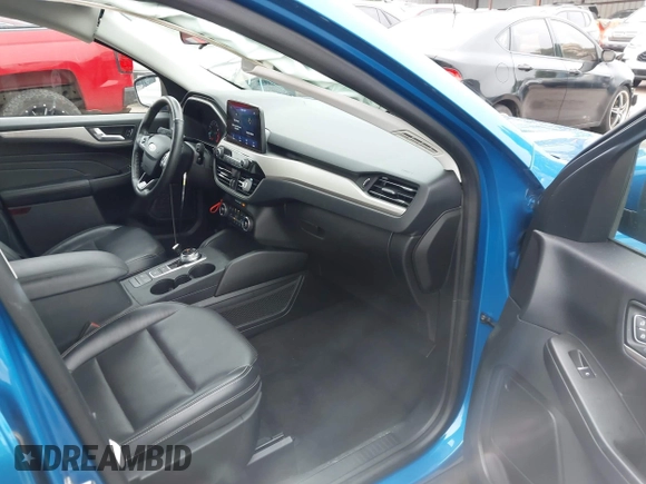 2021 Ford Escape SEL z VIN 1FMCU9H6XMUA63812, wystawiony jako IAAI lot #42418390 z przebiegiem 88 263 mil mil oraz . Historia ofert i sprzedaży dostępna na DreamBid. Obrazek 5.