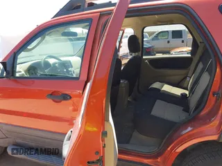 2006 Ford Escape XLT with VIN 1FMYU03186KA86260, listed as a IAAI auction lot 41912070 with 128,167 mi miles and . Bid and sale history available at DreamBid. Image 8.