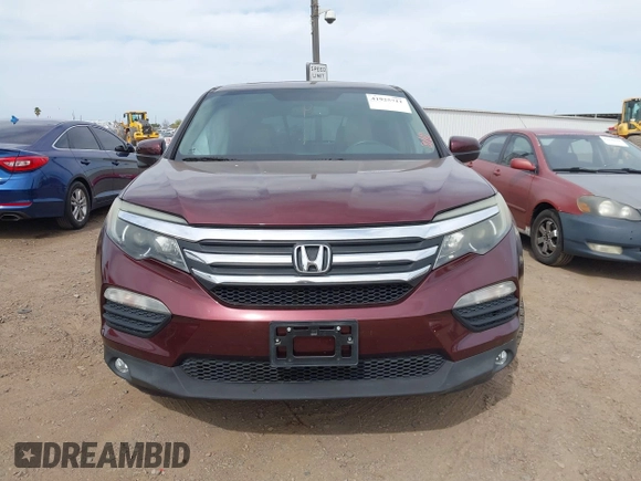 2016 Honda Pilot EX-L with VIN 5FNYF5H57GB028307, listed as a IAAI auction lot 41925711 with 125,118 mi miles and . Bid and sale history available at DreamBid. Image 12.