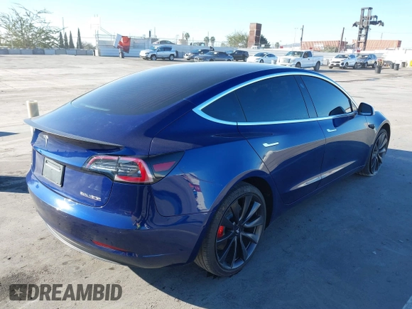 2020 Tesla Model 3 Performance z VIN 5YJ3E1ECXLF641945, wystawiony jako IAAI lot #41337826 z przebiegiem 53 336 mil mil oraz . Historia ofert i sprzedaży dostępna na DreamBid. Obrazek 4.