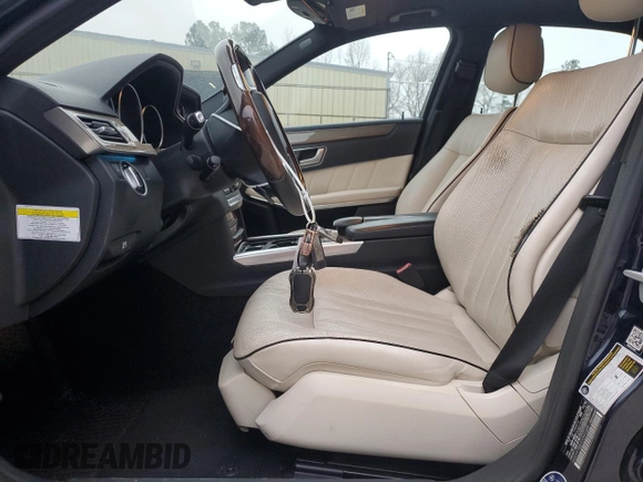 2014 Mercedes-Benz E 550 Sport with VIN WDDHF9BB2EA941669, listed as a Copart auction lot 43350365 with 131,978 mi miles and Salvage Title. Bid and sale history available at DreamBid. Image 7.