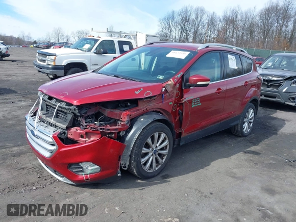 2017 Ford Escape Titanium with VIN 1FMCU0JD9HUC71738, listed as a IAAI auction lot 41673228 with 173,615 mi miles. Bid and sale history available at carsss.com. Image 17.
