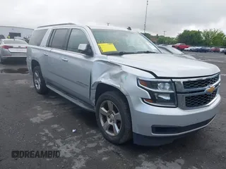 2015 Chevrolet Suburban LT z VIN 1GNSCJKC2FR144528, wystawiony jako IAAI lot #42320028 z przebiegiem 226 076 mil mil oraz . Historia ofert i sprzedaży dostępna na DreamBid. Obrazek 1.