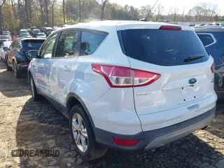 2016 Ford Escape SE with VIN 1FMCU0G97GUA80692, listed as a IAAI auction lot 41860124 with 122,251 mi miles. Bid and sale history available at carsss.com. Image 3.