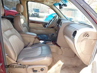 2004 GMC Envoy SLE with VIN 1GKDS13S342287315, listed as a IAAI auction lot 41486715 with 186,129 mi miles. Bid and sale history available at carsss.com. Image 5.