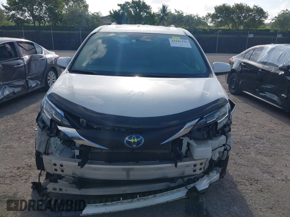 2021 Toyota Sienna XLE with VIN 5TDYRKEC7MS017968, listed as a IAAI auction lot 42145440 with 85,989 mi miles and . Bid and sale history available at DreamBid. Image 13.
