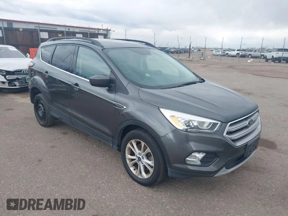 2017 Ford Escape SE with VIN 1FMCU9GD1HUB46034, listed as a IAAI auction lot 41840906 with 143,806 mi miles. Bid and sale history available at carsss.com. Image 1.