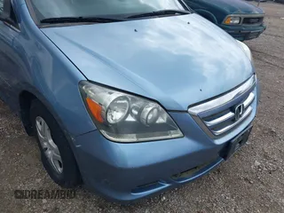 2005 Honda Odyssey EX-L z VIN 5FNRL38755B126414, wystawiony jako IAAI lot #42327946 z przebiegiem 340 043 mil mil oraz . Historia ofert i sprzedaży dostępna na DreamBid. Obrazek 6.