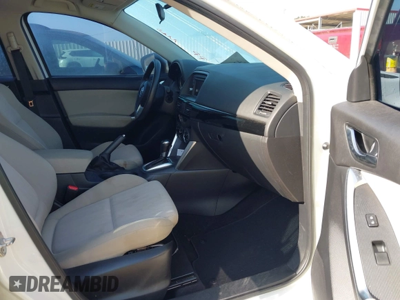 2015 Mazda CX-5 Sport with VIN JM3KE2BE6F0541469, listed as a IAAI auction lot 42632906 with 166,257 mi miles and . Bid and sale history available at DreamBid. Image 5.