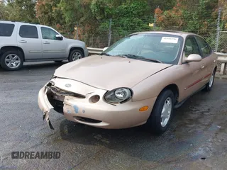 1997 Ford Taurus GL z VIN 1FALP52U2VA273762, wystawiony jako IAAI lot #41956536 z przebiegiem 177 340 mil mil oraz . Historia ofert i sprzedaży dostępna na DreamBid. Obrazek 2.