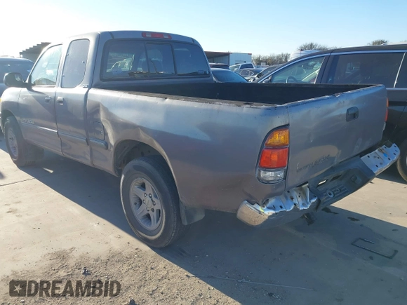 2000 Toyota Tundra SR5 with VIN 5TBRT3413YS019873, listed as a IAAI auction lot 41412497 with 305,472 mi miles and . Bid and sale history available at DreamBid. Image 3.