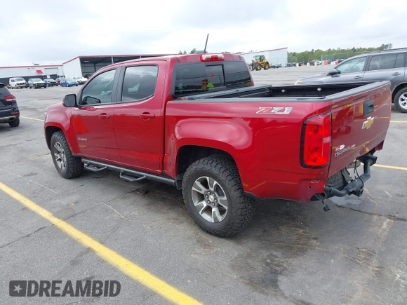 2020 Chevrolet Colorado 4WD Z71 with VIN 1GCGTDEN3L1132444, listed as a IAAI auction lot 41898911 with 65,493 mi miles and . Bid and sale history available at DreamBid. Image 3.