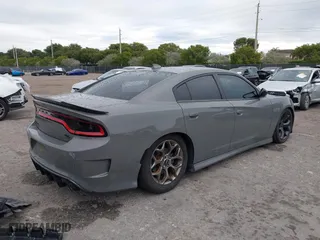 2018 Dodge Charger Daytona with VIN 2C3CDXCT2JH188523, listed as a IAAI auction lot 41351342 with 127,127 mi miles. Bid and sale history available at carsss.com. Image 4.