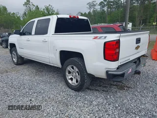 2015 Chevrolet Silverado 1500 LT with VIN 3GCUKREC1FG465118, listed as a IAAI auction lot 41864753 with 290,367 mi miles. Bid and sale history available at carsss.com. Image 3.