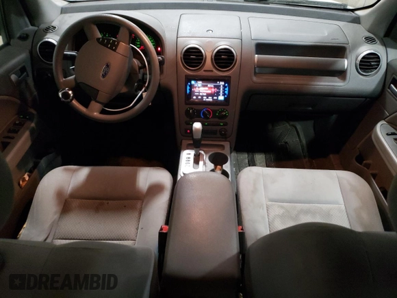 2006 Ford Freestyle SE z VIN 1FMZK01196GA42865, wystawiony jako Copart lot #51191025 z przebiegiem 163 694 mil mil oraz Tytuł czysty. Historia ofert i sprzedaży dostępna na DreamBid. Obrazek 8.