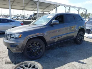2018 Jeep Grand Cherokee Altitude with VIN 1C4RJEAGXJC437758, listed as a IAAI auction lot 41692624 with 62,433 mi miles. Bid and sale history available at carsss.com. Image 18.