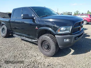 2014 Ram 2500 Laramie with VIN 3C6UR5FL1EG265977, listed as a IAAI auction lot 42068682 with 159,694 mi miles and . Bid and sale history available at DreamBid. Image 1.