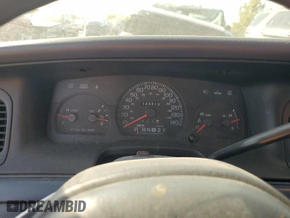1999 Ford Crown Victoria Police z VIN 2FAFP71W7XX156457, wystawiony jako Copart lot #71623954 z przebiegiem 123 313 mil mil oraz Szkody całkowita. Historia ofert i sprzedaży dostępna na DreamBid. Obrazek 9.