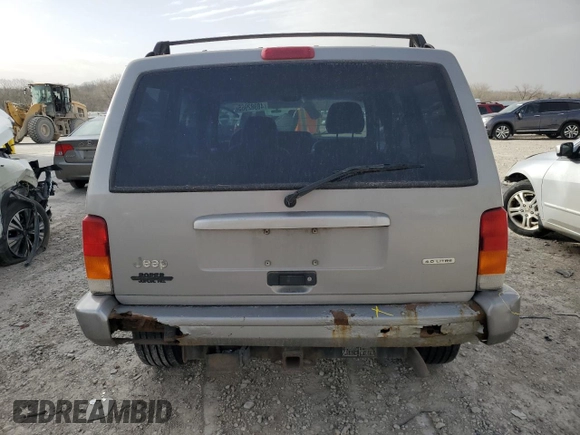 2001 Jeep Cherokee Sport z VIN 1J4FF58SX1L576572, wystawiony jako Copart lot #48982965 z przebiegiem 174 500 mil mil oraz Szkoda całkowita • Salvage title. Historia ofert i sprzedaży dostępna na DreamBid. Obrazek 6.