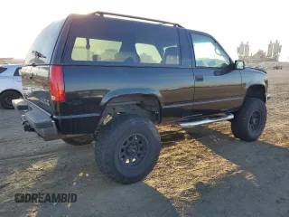 1998 Chevrolet Tahoe z VIN 3GNEK18R6WG102052, wystawiony jako Copart lot #77485244 z przebiegiem 187 542 mil mil oraz Szkoda całkowita • Salvage title. Historia ofert i sprzedaży dostępna na DreamBid. Obrazek 3.