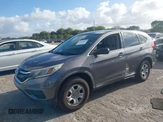 2015 Honda CR-V LX with VIN 2HKRM3H34FH510312, listed as a IAAI auction lot 41952816 with 111,712 mi miles and . Bid and sale history available at carsss.com. Image 18.