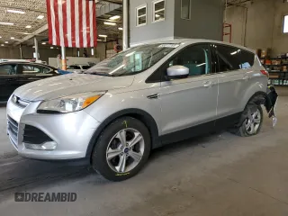 2013 Ford Escape SE with VIN 1FMCU0GXXDUB10035, listed as a Copart auction lot 56817785 with 130,497 mi miles and Salvage title. Bid and sale history available at DreamBid. Image 1.