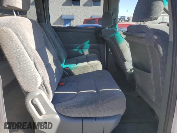 2003 Honda Odyssey LX z VIN 5FNRL18573B116337, wystawiony jako Copart lot #86184364 z przebiegiem 247 492 mil mil oraz Szkoda całkowita • Salvage title. Historia ofert i sprzedaży dostępna na DreamBid. Obrazek 11.