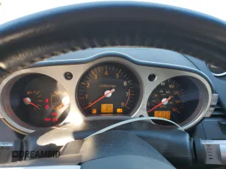 2004 Nissan 350Z Touring with VIN JN1AZ34E54T061403, listed as a Copart auction lot 57346704 with 127,602 mi miles and Salvage Title. Bid and sale history available at carsss.com. Image 9.