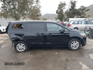 2015 Kia Sedona LX with VIN KNDMB5C14F6051455, listed as a IAAI auction lot 41991513 with 154,967 mi miles and . Bid and sale history available at DreamBid. Image 13.