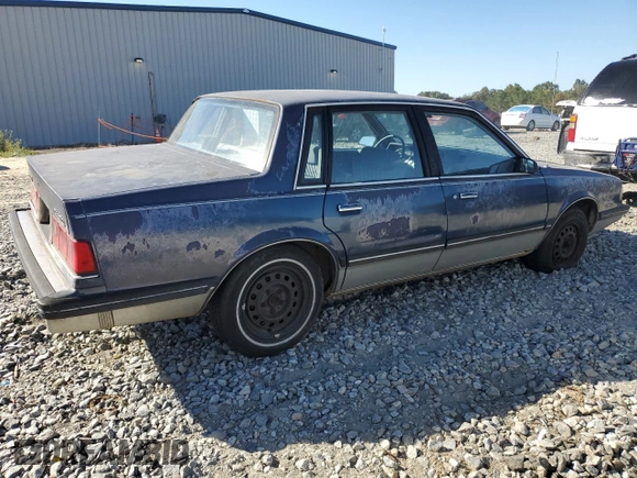1989 Chevrolet Celebrity z VIN 1G1AW51W8K6185894, wystawiony jako Copart lot #75610854 z przebiegiem 111 268 mil mil oraz Czysty tytuł • Clean title. Historia ofert i sprzedaży dostępna na DreamBid. Obrazek 3.