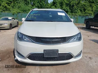 2020 Chrysler Pacifica Launch Edition with VIN 2C4RC3BGXLR267876, listed as a IAAI auction lot 42424841 with 87,586 mi miles and . Bid and sale history available at DreamBid. Image 12.
