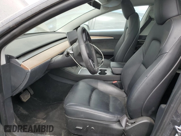 2023 Tesla Model 3 with VIN 5YJ3E1EA8PF677153, listed as a Copart auction lot 51065165 with 27,088 mi miles and Salvage Title. Bid and sale history available at carsss.com. Image 7.