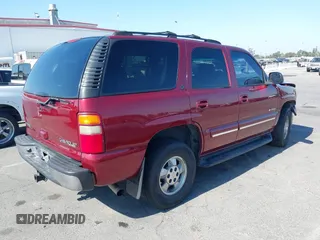 2003 Chevrolet Tahoe LS with VIN 1GNEC13T53R131019, listed as a IAAI auction lot 39673270 with 222,521 mi miles. Bid and sale history available at carsss.com. Image 4.