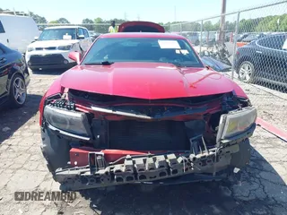 2014 Chevrolet Camaro LT z VIN 2G1FC1E38E9242518, wystawiony jako IAAI lot #41988618 z przebiegiem 90 993 mil mil oraz . Historia ofert i sprzedaży dostępna na DreamBid. Obrazek 6.
